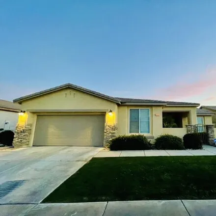 Rent this 4 bed house on 81481 Ave Romero in Indio, CA 92201