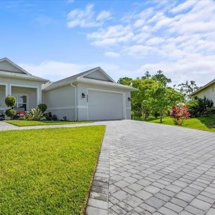 Buy this 4 bed house on Windy Pines Lane in Port Saint Lucie, FL 34986