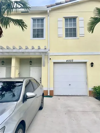 Rent this 3 bed townhouse on 4038 Northwest 11th Place in Lauderhill, FL 33313