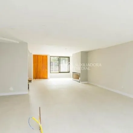 Rent this 3 bed house on Avenida Guaíba 11402 in Ipanema, Porto Alegre - RS