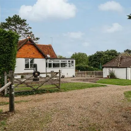 Buy this 4 bed house on Kings Mill Lane in South Nutfield, RH1 5NB
