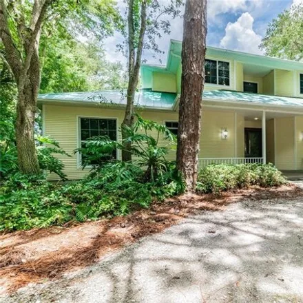 Buy this 4 bed house on Calahoosahatchee St in Victor, Tarpon Springs