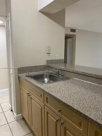 Image 4 - 4400 W 16th Ave Apt 235, Hialeah, Florida, 33012 - Condo for rent