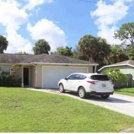 Buy this 3 bed house on 1650 Southwest Ruiz Terrace in Port Saint Lucie, FL 34953