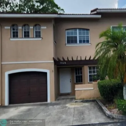 Buy this 3 bed townhouse on 9528 SW 1st Pl Unit 10B in Coral Springs, Florida