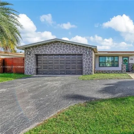 Buy this 4 bed house on 10644 Northwest 20th Street in Pembroke Pines, FL 33026