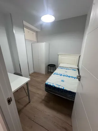 Rent this 7 bed room on Avenida del Mediterráneo in 28007 Madrid, Spain