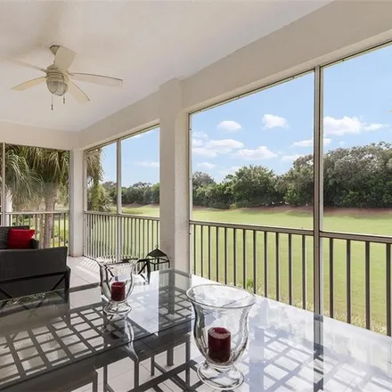 Buy this 3 bed condo on 1621 Winding Oaks Way in Four Seasons, Collier County