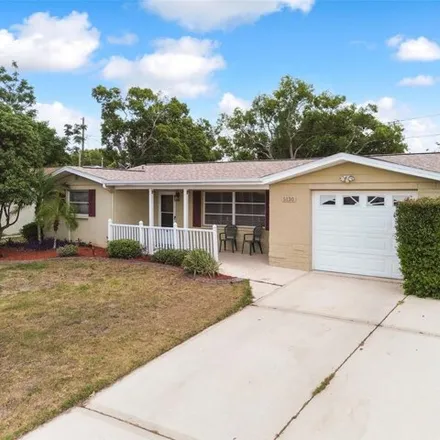 Buy this 3 bed house on 5194 Lofton Drive in Elfers, FL 34652