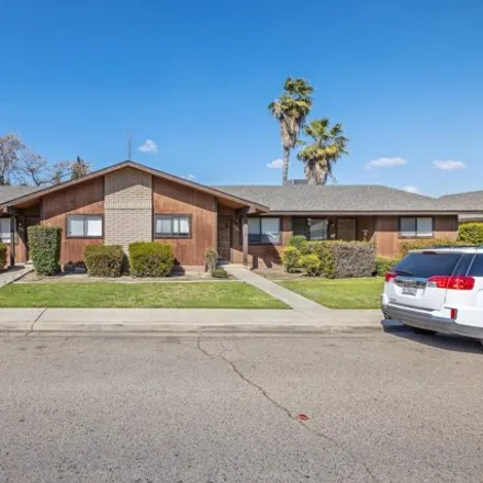 Buy this 8 bed house on 5212 West Cambridge Avenue in Visalia, CA 93277