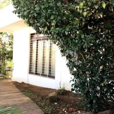 Buy this 4 bed house on Travessa Ruperti in Chácara das Pedras, Porto Alegre - RS