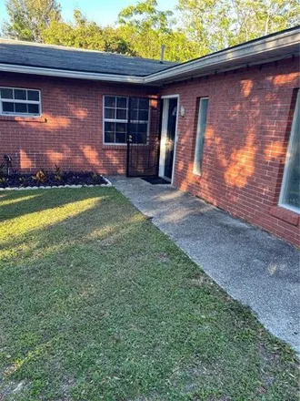Rent this 4 bed house on 2604 Kiwanis Avenue in Polk County, FL 33801
