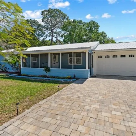 Buy this 4 bed house on 3100 Mildred Dr in Palm Harbor, Florida