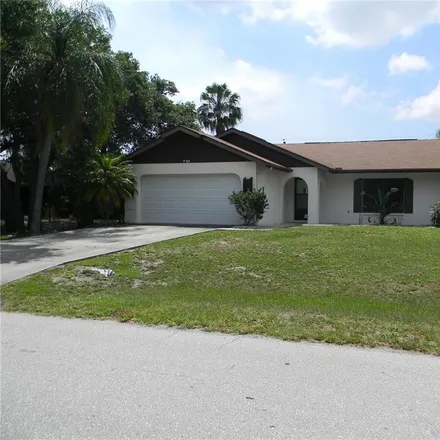 Rent this 3 bed house on 1011 Tropical Avenue Northwest in Port Charlotte, FL 33948