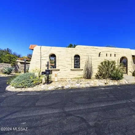 Buy this 3 bed townhouse on 5273 Tigua Drive in Pima County, AZ 85704