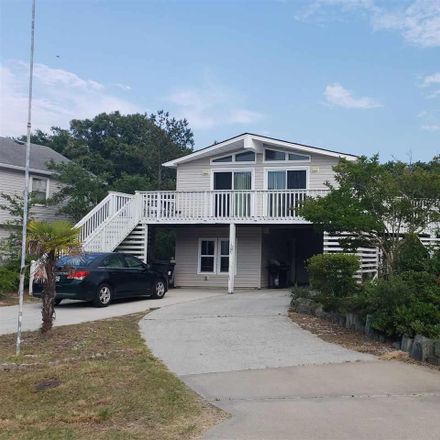 Rent this 4 bed house on 1627 Village Lane in Kill Devil Hills, NC 27948