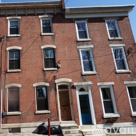 Rent this 3 bed townhouse on 141 Dupont St