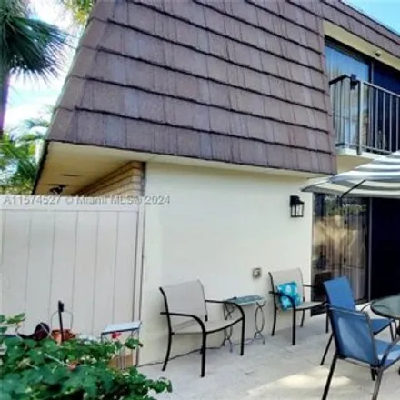 Buy this 2 bed townhouse on 6999 69th Way in West Palm Beach, FL 33407