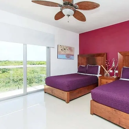 Rent this 2 bed condo on Toks Playa del Carmen in Chemuyil 52 Mza 1Lt.1 Local A-10, Santa Fe