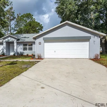 Buy this 3 bed house on 6 White Rock Place in Palm Coast, FL 32164