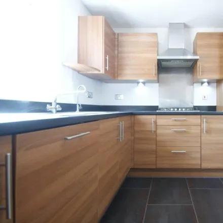Rent this 4 bed house on 55 Collins Drive in Wokingham, RG6 5AE