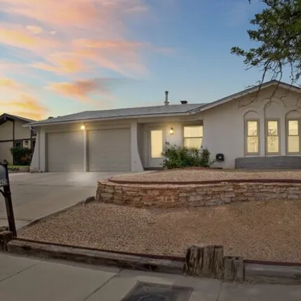 Buy this 3 bed house on 1492 Willys Knight Drive Northeast in Monte Largo Hills, Albuquerque