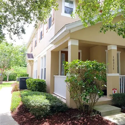Buy this 3 bed townhouse on 10317 Lake District Lane in Orlando, FL 32832