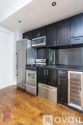 Rent this 2 bed apartment on 309 E 8th St