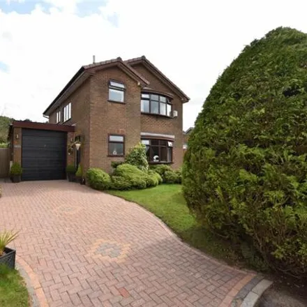 Buy this 4 bed house on Castlemere Drive in Shaw, OL2 8TQ