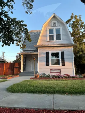 Rent this 4 bed house on 323 W Myrtle Street