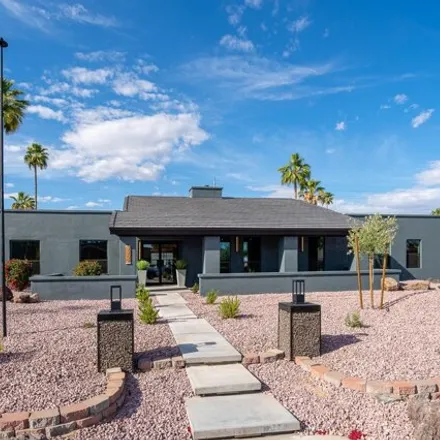 Buy this 4 bed house on 7702 West Villa Theresa Drive in Glendale, AZ 85308