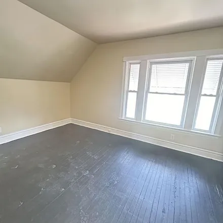 Rent this 3 bed apartment on 7322 South Kenwood Avenue in Chicago, IL 60619