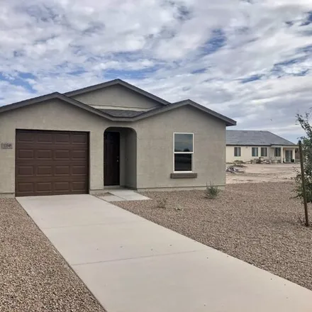 Rent this 4 bed house on 13532 West Camelia Drive in Arizona City, Pinal County
