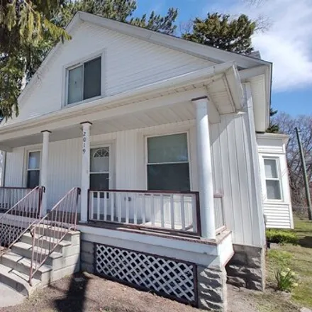 Buy this 4 bed house on 1166 Woodland Street in Bay City, MI 48706