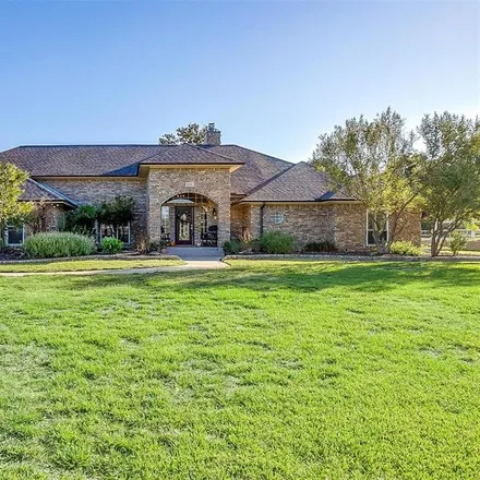 Buy this 4 bed house on 6081 Oak Hollow Drive in Tarrant County, TX 76028