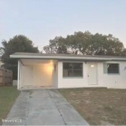 Rent this 3 bed house on 985 N Carpenter Rd in Titusville, Florida