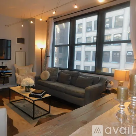 Rent this 2 bed apartment on 5 N Wabash Ave