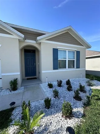 Rent this 4 bed house on Bernard Boulevard in Haines City, FL
