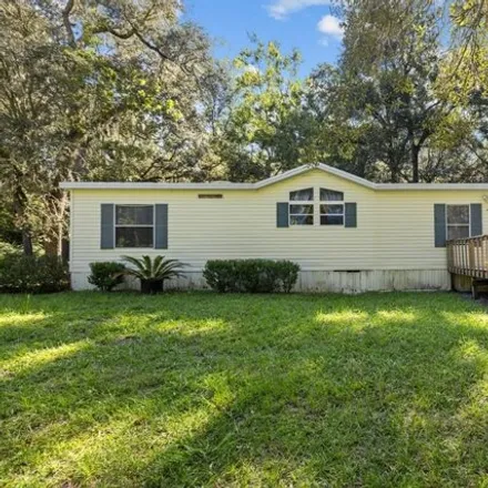Buy this studio apartment on 17605 NW 73 TER in Levy County, FL 32693