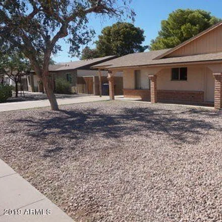 Rent this 3 bed house on 94 East Duke Drive in Tempe, AZ 85283