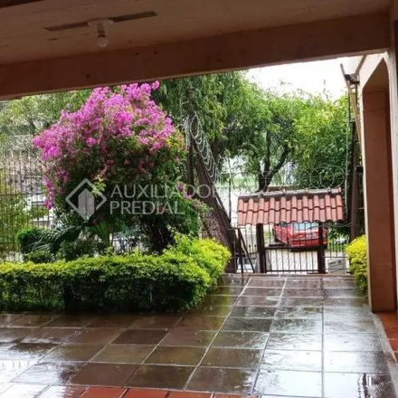 Buy this 3 bed apartment on Rua Guilherme Schell 268 in Santo Antônio, Porto Alegre - RS