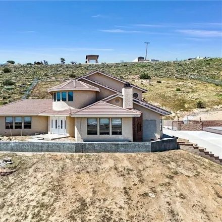 Buy this 4 bed house on 7456 Calpella Avenue in Hesperia, CA 92345