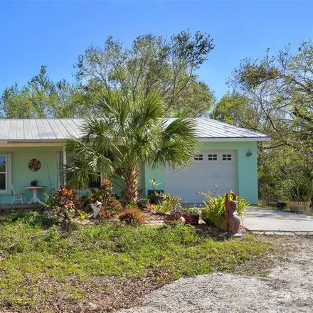 Buy this 3 bed house on 6352 Austrian Boulevard in Charlotte County, FL 33982