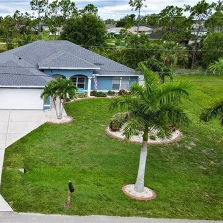 Buy this 4 bed house on 4128 NE 21st Pl in Cape Coral, Florida