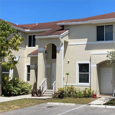 Rent this 2 bed townhouse on 835 Northeast 212th Terrace in Miami-Dade County, FL 33179