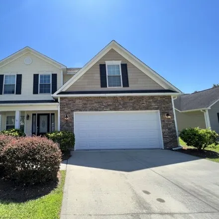 Rent this 3 bed house on 8559 Old Forest Drive Northeast in Leland, NC 28451