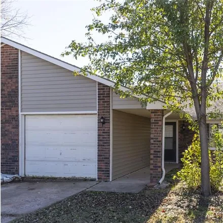 Rent this 3 bed townhouse on 1413 W Nottingham Cir in Wichita, KS