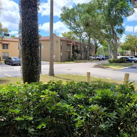 Rent this 3 bed apartment on 4462 Treehouse Lane in Tamarac, FL 33319