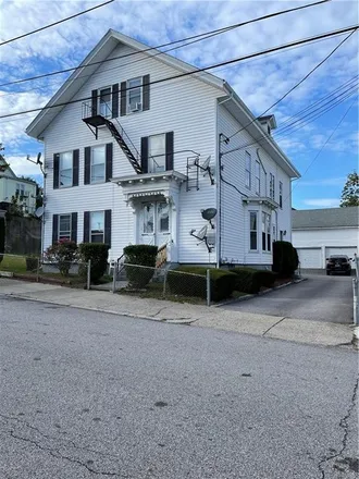 Buy this 11 bed townhouse on 27 Summit Street in Central Falls, RI 02863