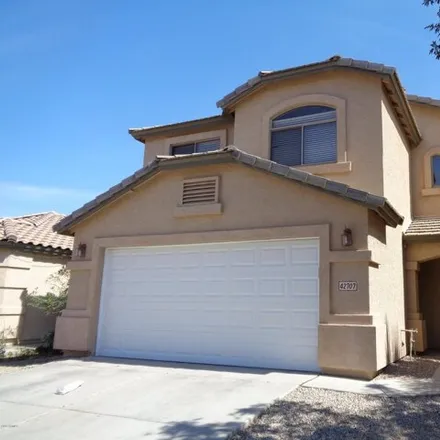 Rent this 3 bed house on 42765 West Sunland Drive in Maricopa, AZ 85138